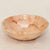 A boxelder bowl with natural-colored pink and black details. 