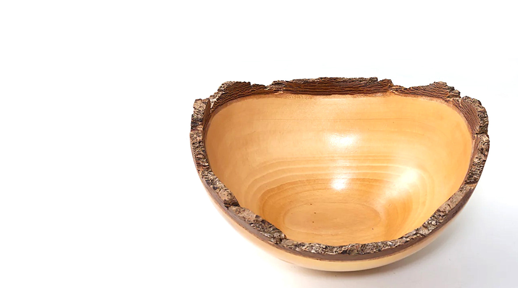 Woodturned bowl with bark edge