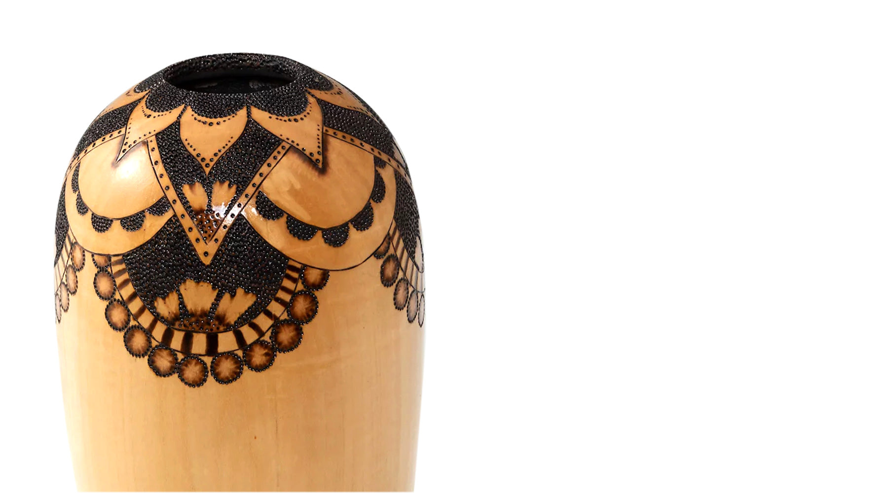 Light colored vase with  pyrography details